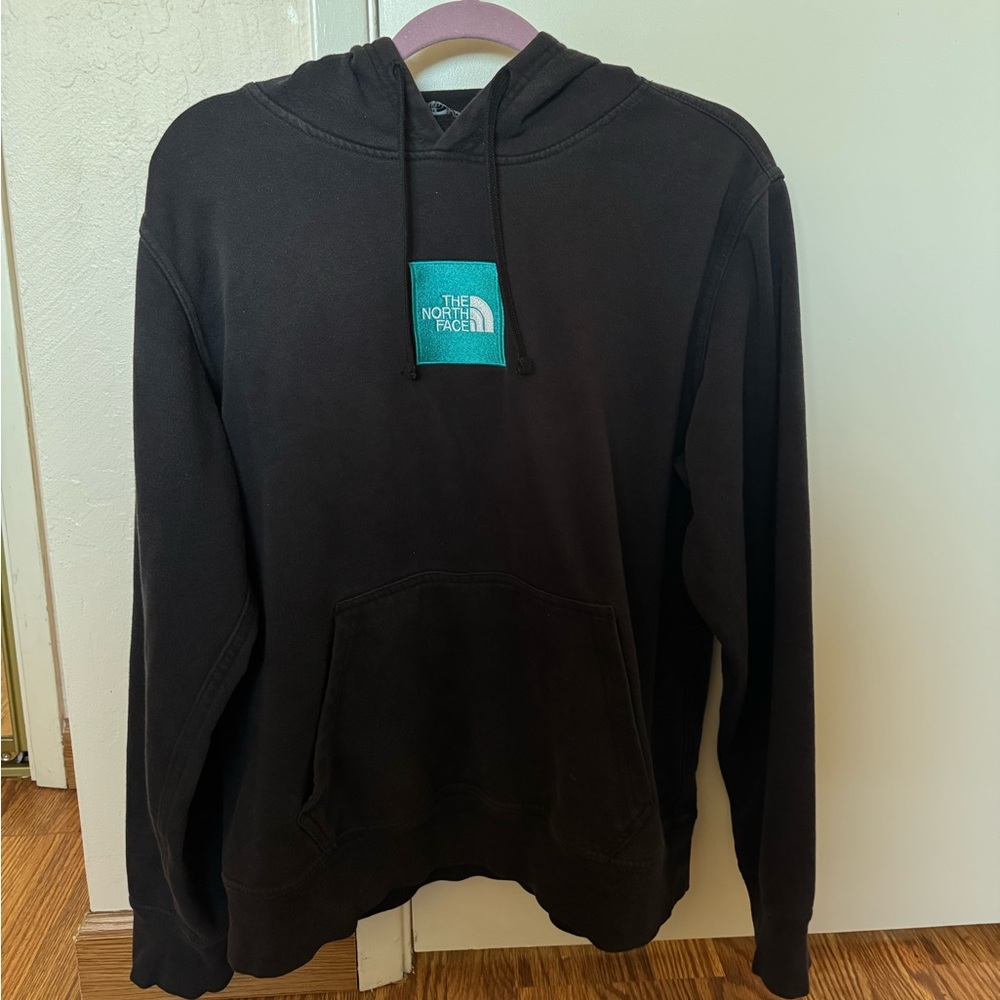 The North Face Black Hoodie with Teal Logo